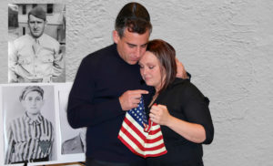 Mike Ross and Brenda Sattler Beaty hold the little American flag that Lt. Steve Sattler gave to Holocaust Survivor Steve Ross in 1945 at the end of World War II photo by Tony Bennis